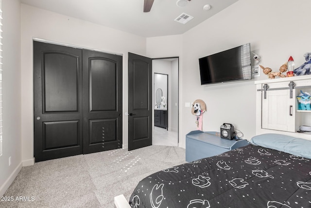 bedroom with carpet, visible vents, and baseboards