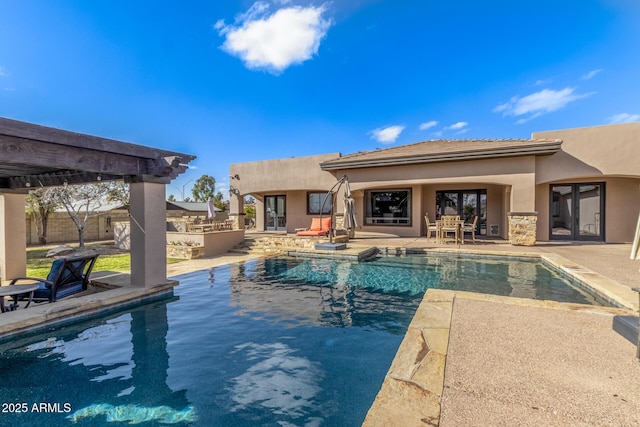 pool with a patio area