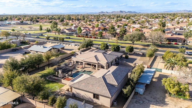 birds eye view of property featuring a residential view and a mountain view