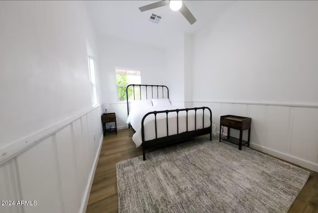 bedroom featuring dark hardwood / wood-style floors and ceiling fan