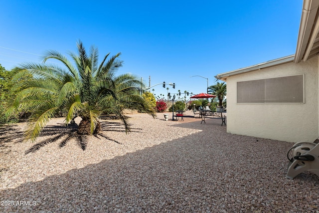 view of yard with a patio area