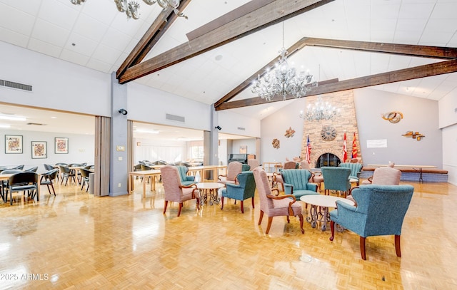 interior space featuring a notable chandelier, beam ceiling, parquet floors, and a large fireplace