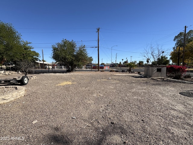 view of yard with a storage shed