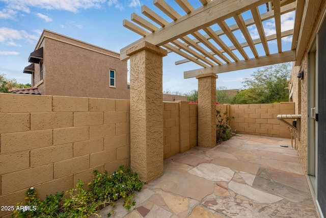 view of patio / terrace featuring a pergola