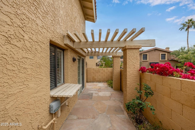 view of patio featuring a pergola