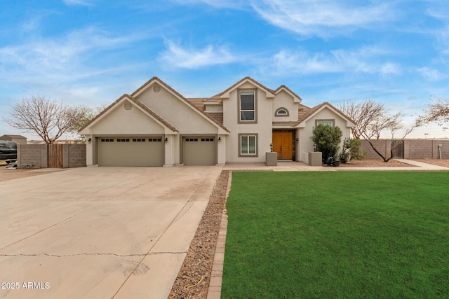 view of front facade featuring a garage and a front lawn