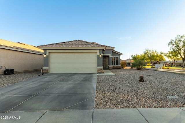 view of front of home with a garage