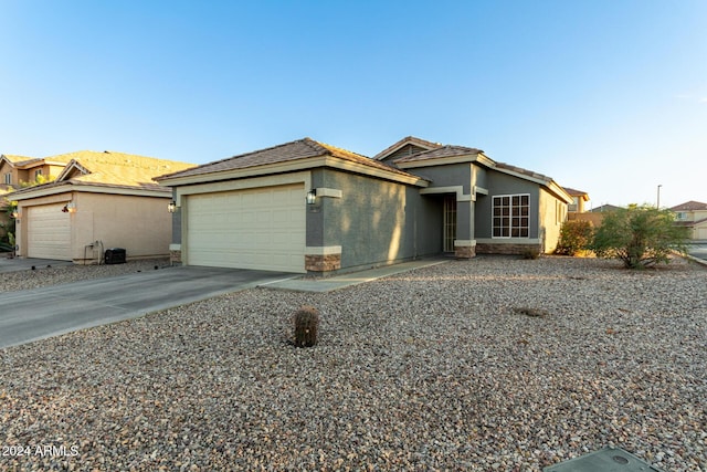 single story home featuring a garage