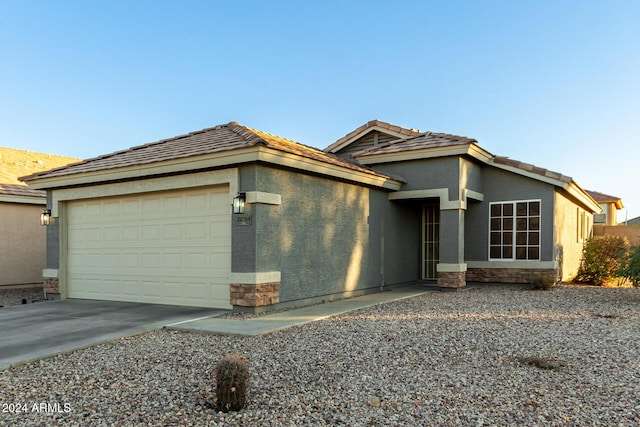 view of front of property with a garage