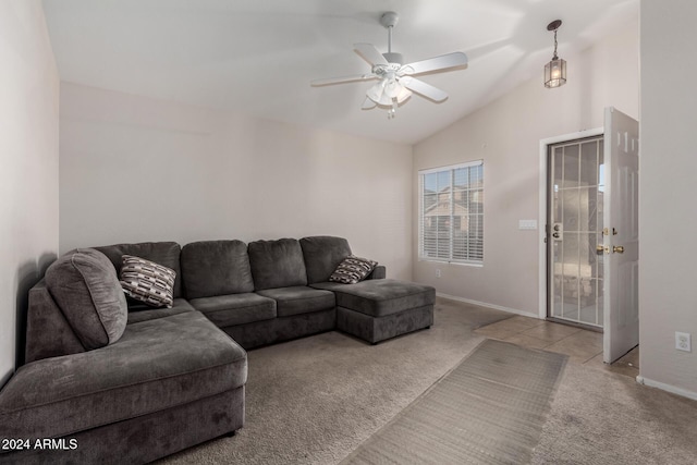 living room featuring light carpet, ceiling fan, and lofted ceiling