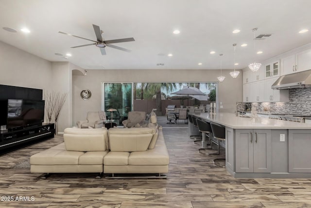 4519 N 29th Way, Phoenix, AZ 85016 - living area with ceiling fan, wood finished floors, and recessed lighting