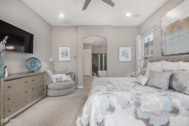 4519 N 29th Way, Phoenix, AZ 85016 - carpeted bedroom with arched walkways, recessed lighting, ensuite bath, and a ceiling fan