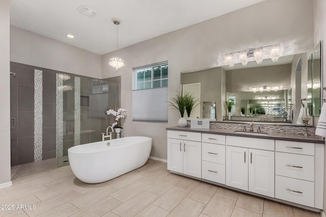 4519 N 29th Way, Phoenix, AZ 85016 - full bathroom with a stall shower, vanity, and a soaking tub