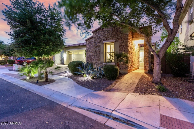 4519 N 29th Way, Phoenix, AZ 85016 - view of front of property featuring stone siding and an attached garage