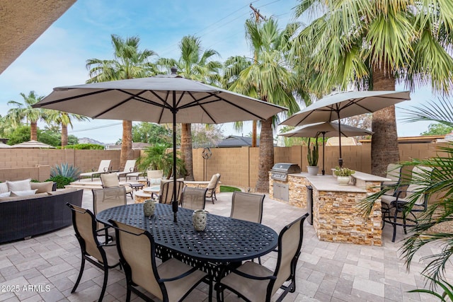 4519 N 29th Way, Phoenix, AZ 85016 - fenced backyard with an outdoor living space, a patio area, outdoor dining space, and an outdoor bar