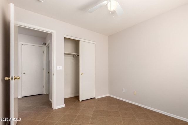 9332 W Mary Ann Dr, Peoria, AZ 85382 - unfurnished bedroom featuring baseboards, a closet, ceiling fan, and light tile patterned floors