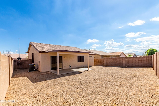 9332 W Mary Ann Dr, Peoria, AZ 85382 - back of property featuring stucco siding, cooling unit, a fenced backyard, a patio area, and a tile roof