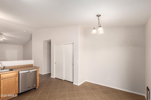 9332 W Mary Ann Dr, Peoria, AZ 85382 - kitchen with stainless steel dishwasher, lofted ceiling, a sink, baseboards, and ceiling fan