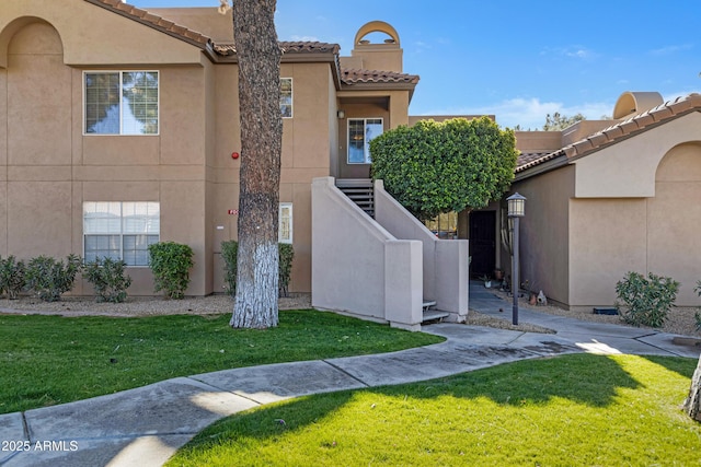 exterior space with a front lawn