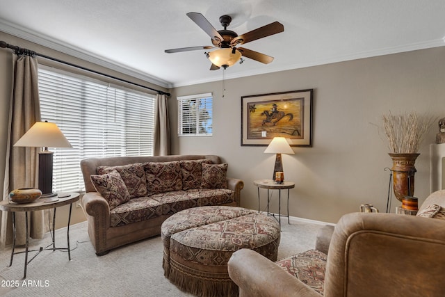 living room featuring crown molding, light colored carpet, and ceiling fan