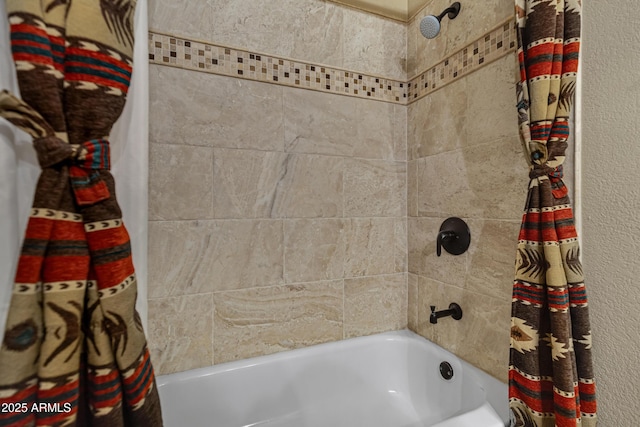 bathroom with shower / tub combo