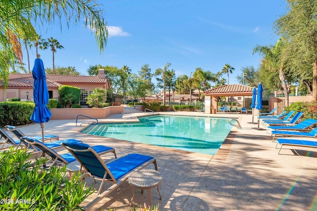 view of pool with a gazebo and a patio area