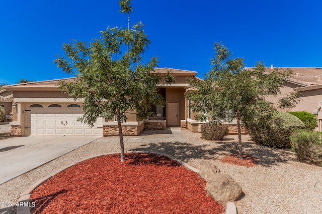 view of front of property featuring a garage