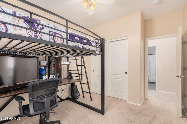 bedroom featuring a closet, carpet flooring, and baseboards