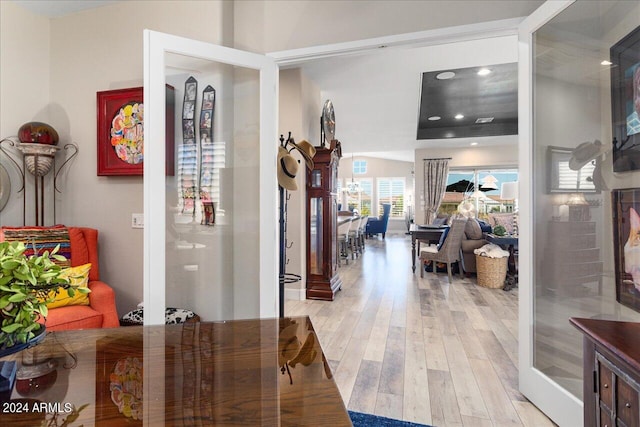 foyer entrance with light wood-type flooring