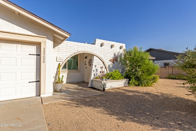 entrance to property with a garage