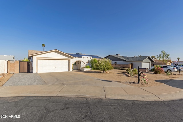 single story home with a garage