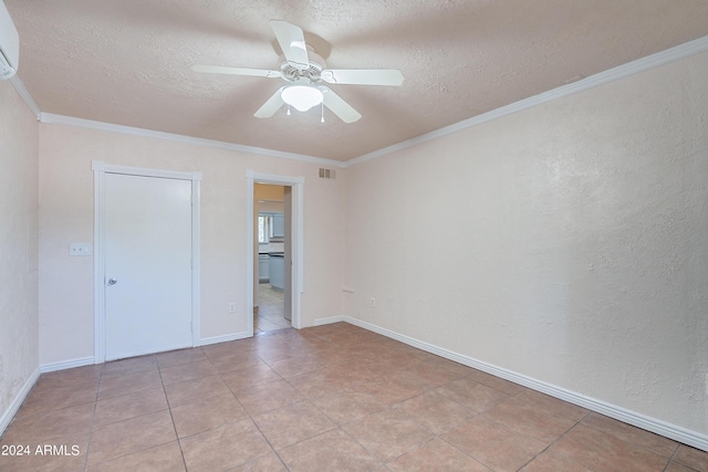 unfurnished bedroom featuring crown molding, an AC wall unit, a textured ceiling, and ceiling fan