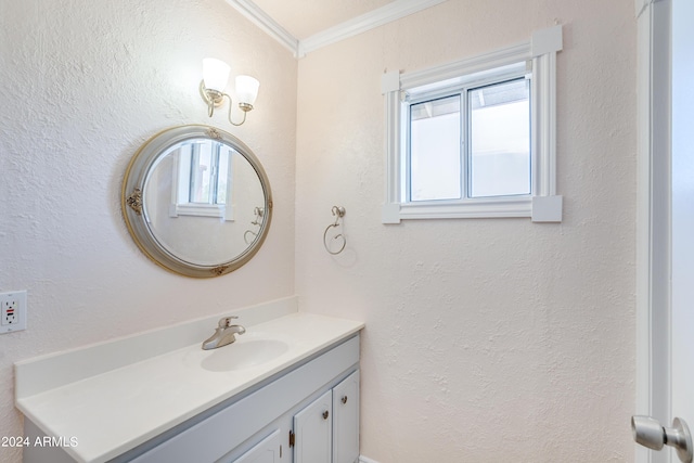 bathroom featuring vanity and crown molding