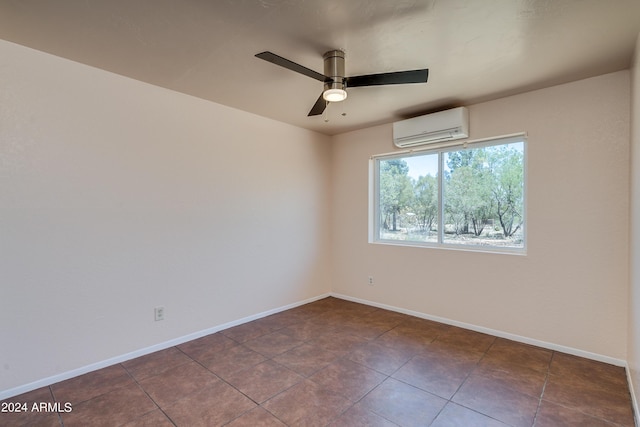 tiled empty room featuring an AC wall unit and ceiling fan