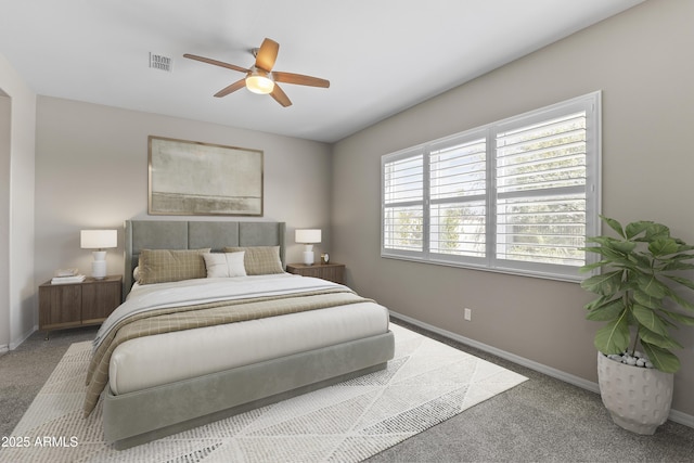 bedroom featuring visible vents, baseboards, a ceiling fan, and carpet flooring