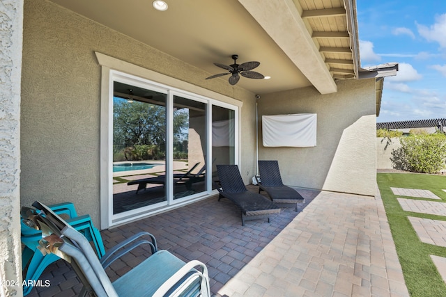 view of patio with ceiling fan