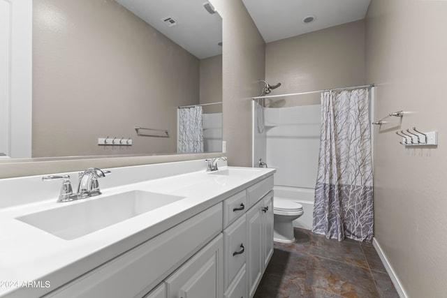 full bathroom with shower / tub combo with curtain, vanity, and toilet