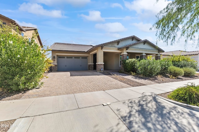 craftsman house with a garage