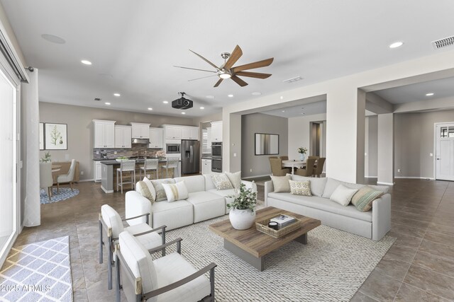 unfurnished living room with sink