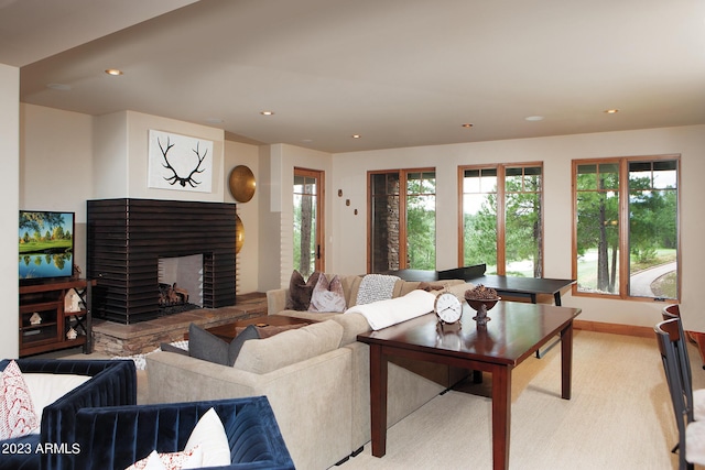 living room featuring a fireplace