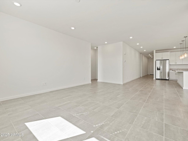 4041 S 176th Dr, Goodyear, AZ 85338 - unfurnished living room with recessed lighting