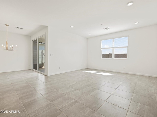 4041 S 176th Dr, Goodyear, AZ 85338 - empty room featuring a chandelier, light tile patterned floors, and recessed lighting