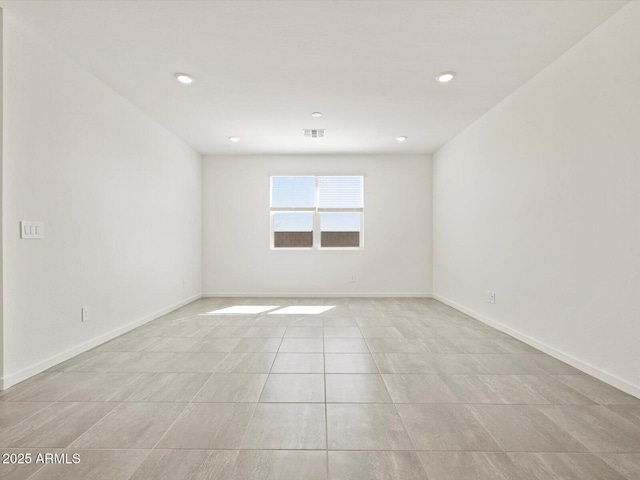 4041 S 176th Dr, Goodyear, AZ 85338 - spare room featuring light tile patterned floors and recessed lighting