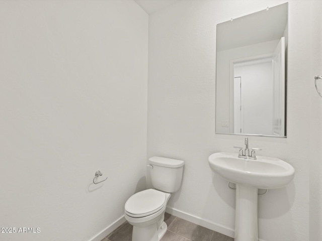 4041 S 176th Dr, Goodyear, AZ 85338 - bathroom featuring toilet and baseboards
