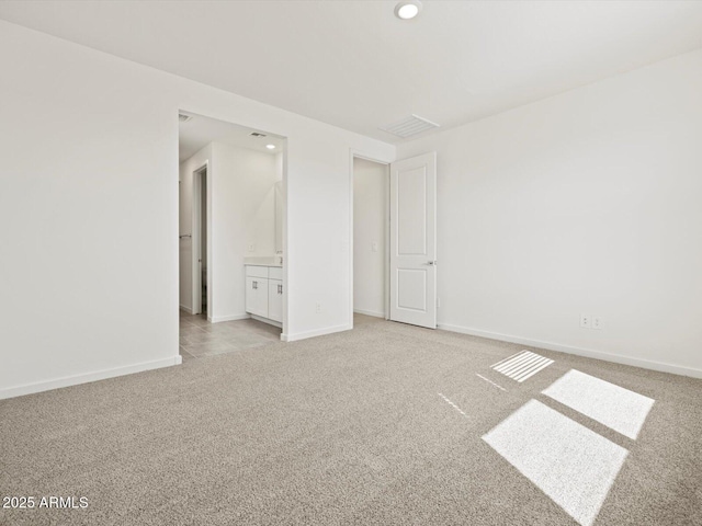 4041 S 176th Dr, Goodyear, AZ 85338 - unfurnished room with light colored carpet and recessed lighting
