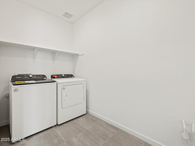 4041 S 176th Dr, Goodyear, AZ 85338 - washroom featuring washing machine and clothes dryer and baseboards