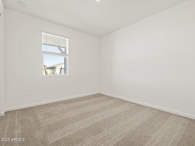4041 S 176th Dr, Goodyear, AZ 85338 - carpeted empty room featuring baseboards and a smoke detector