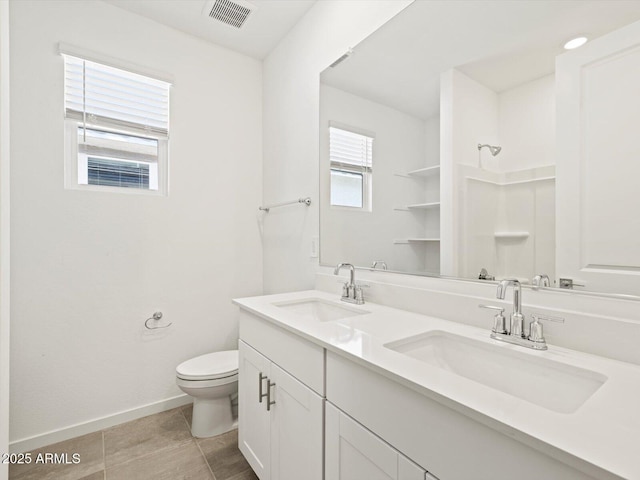 4041 S 176th Dr, Goodyear, AZ 85338 - bathroom featuring toilet and double vanity