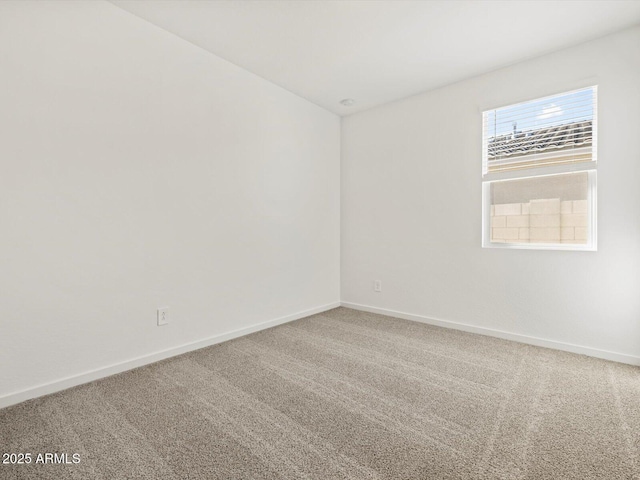 4041 S 176th Dr, Goodyear, AZ 85338 - empty room featuring baseboards and carpet flooring