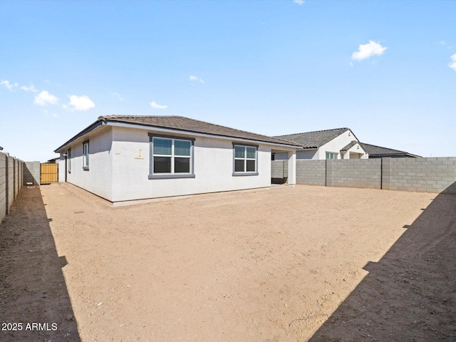 4041 S 176th Dr, Goodyear, AZ 85338 - back of house featuring a fenced backyard